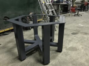 Fabricated octo table